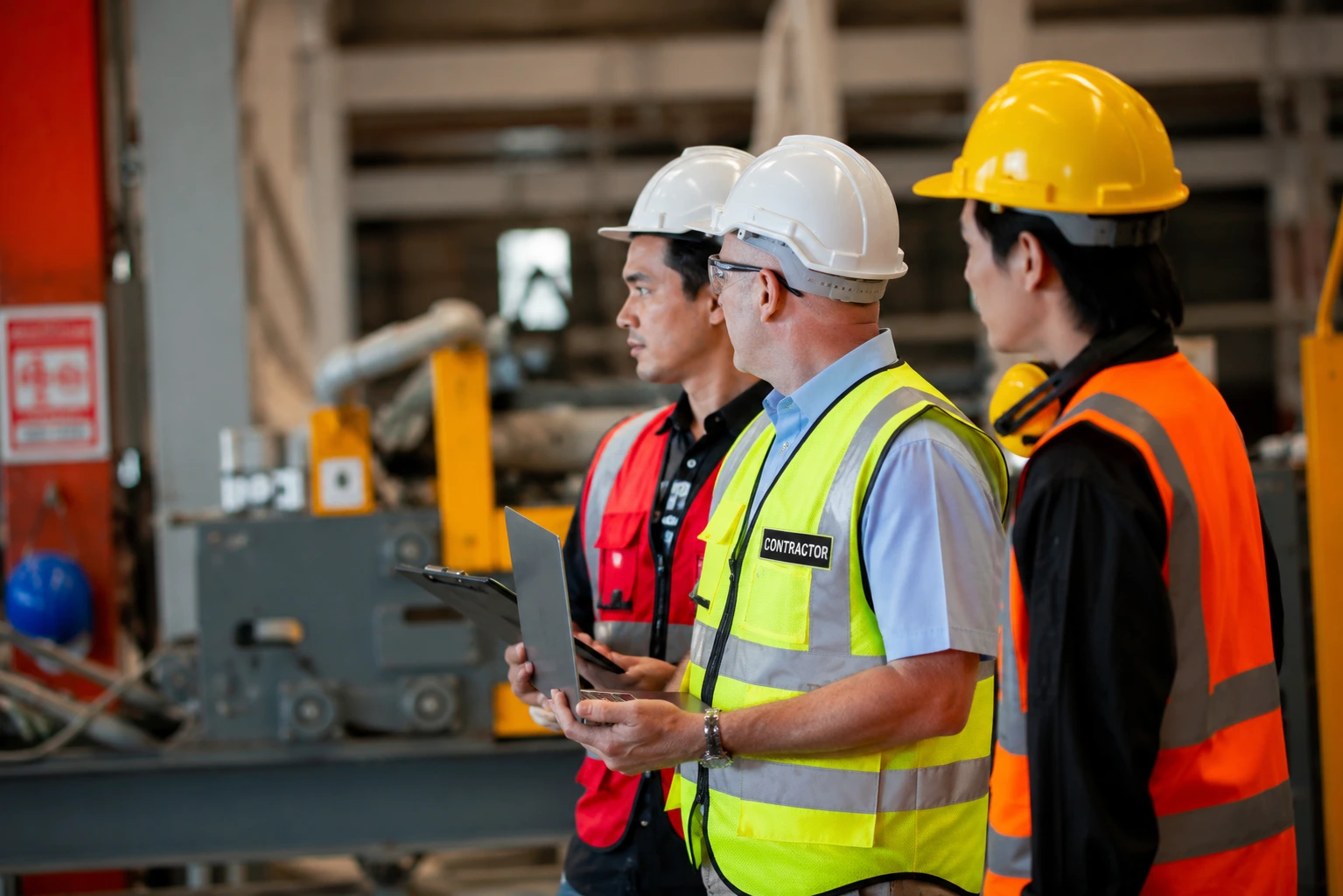 Engineers reviewing construction drawing